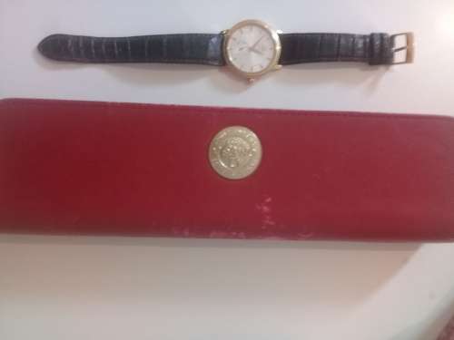 Omega Chronometer 18k Gold with original international warranty and box bought in Geneve 1997